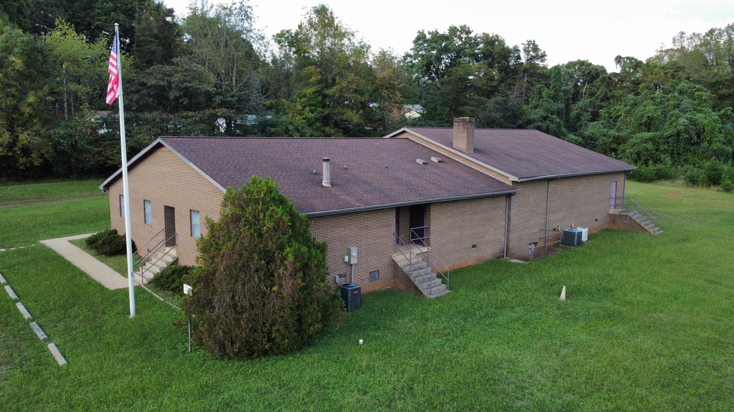 a aerial view of a house with garden