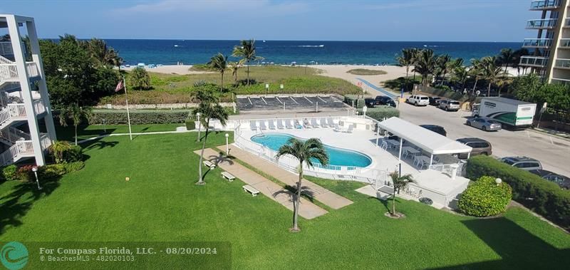 an aerial view of a house having yard