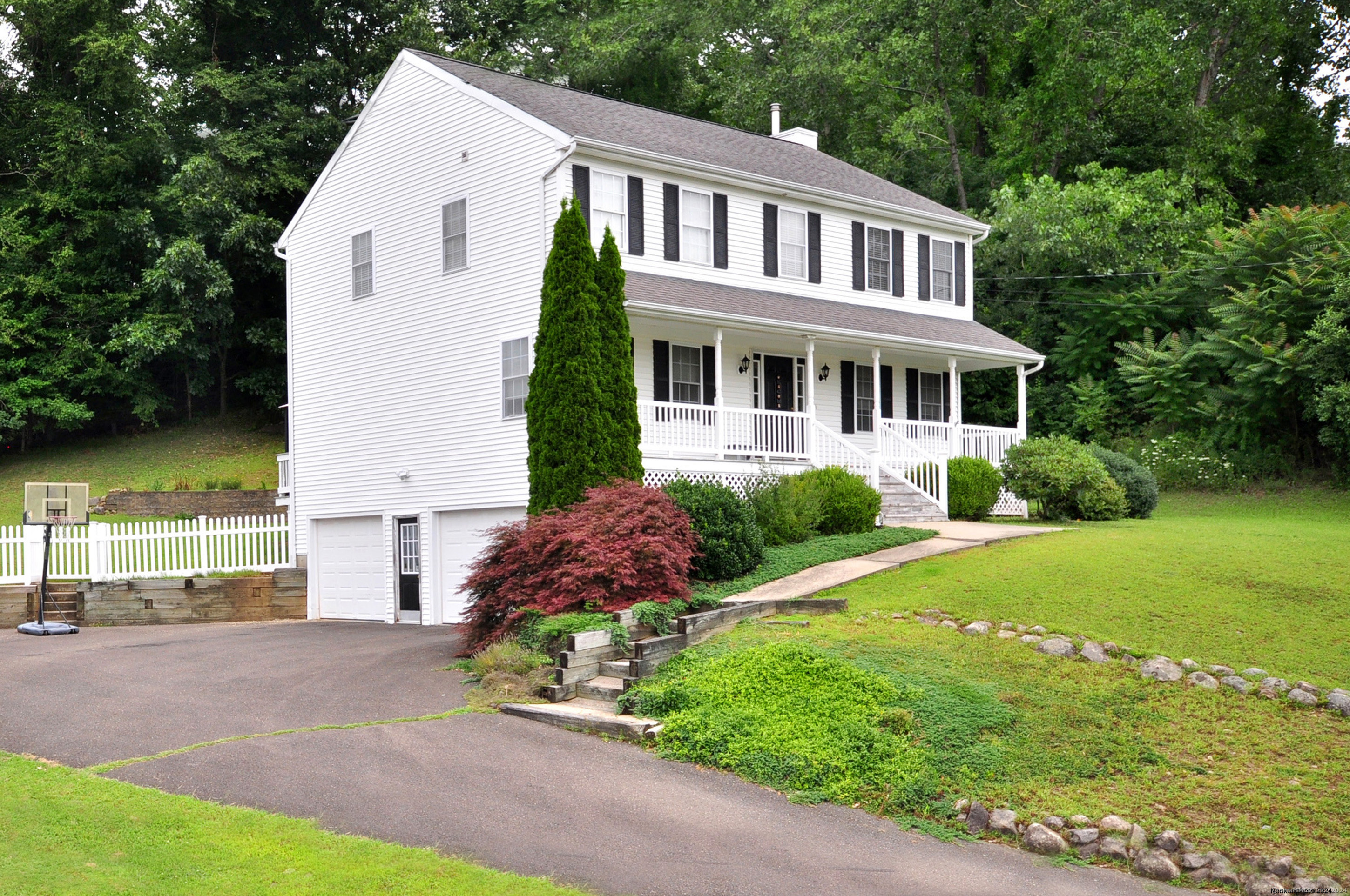 Two-Car Garage Under and the Front Porch