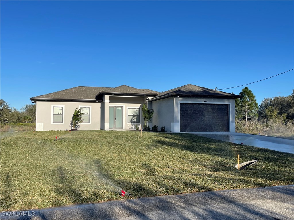 a house with yard in front of it