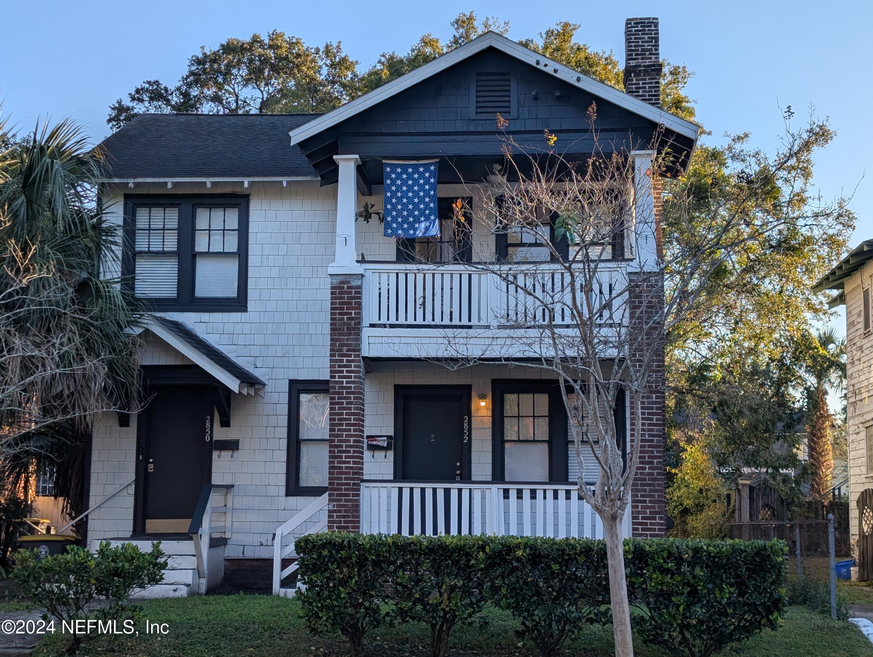 a view of front of a house with a porch