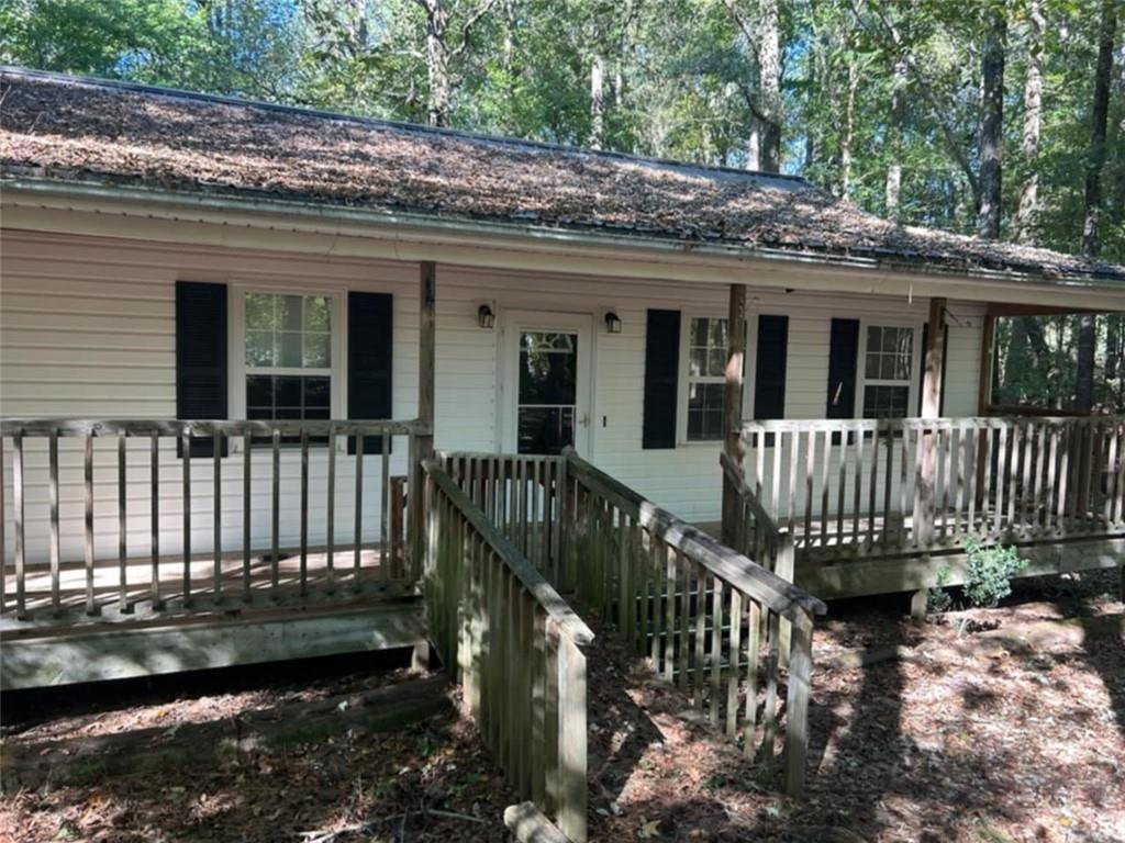 a view of a house with a deck