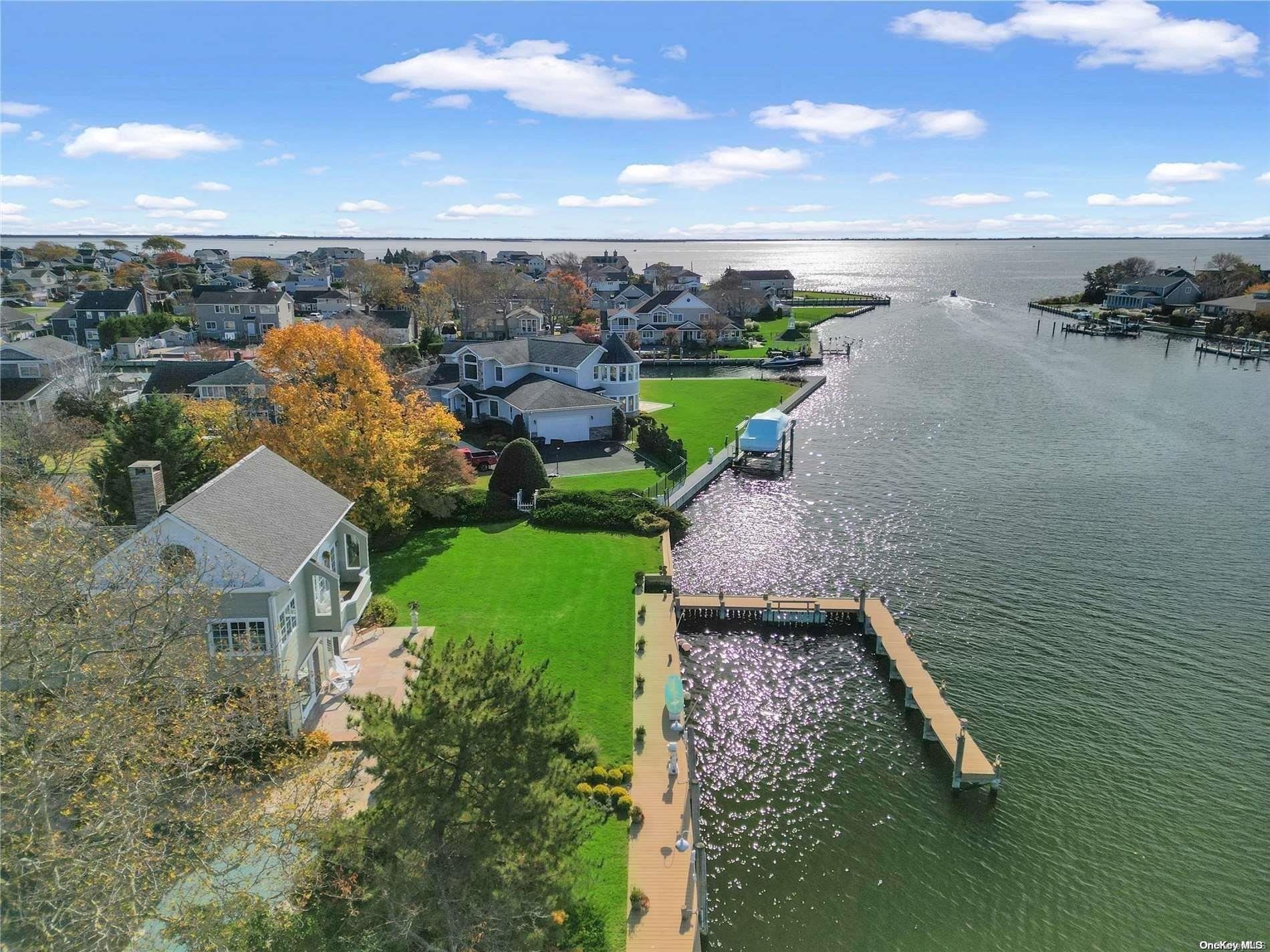 a view of a lake with a yard