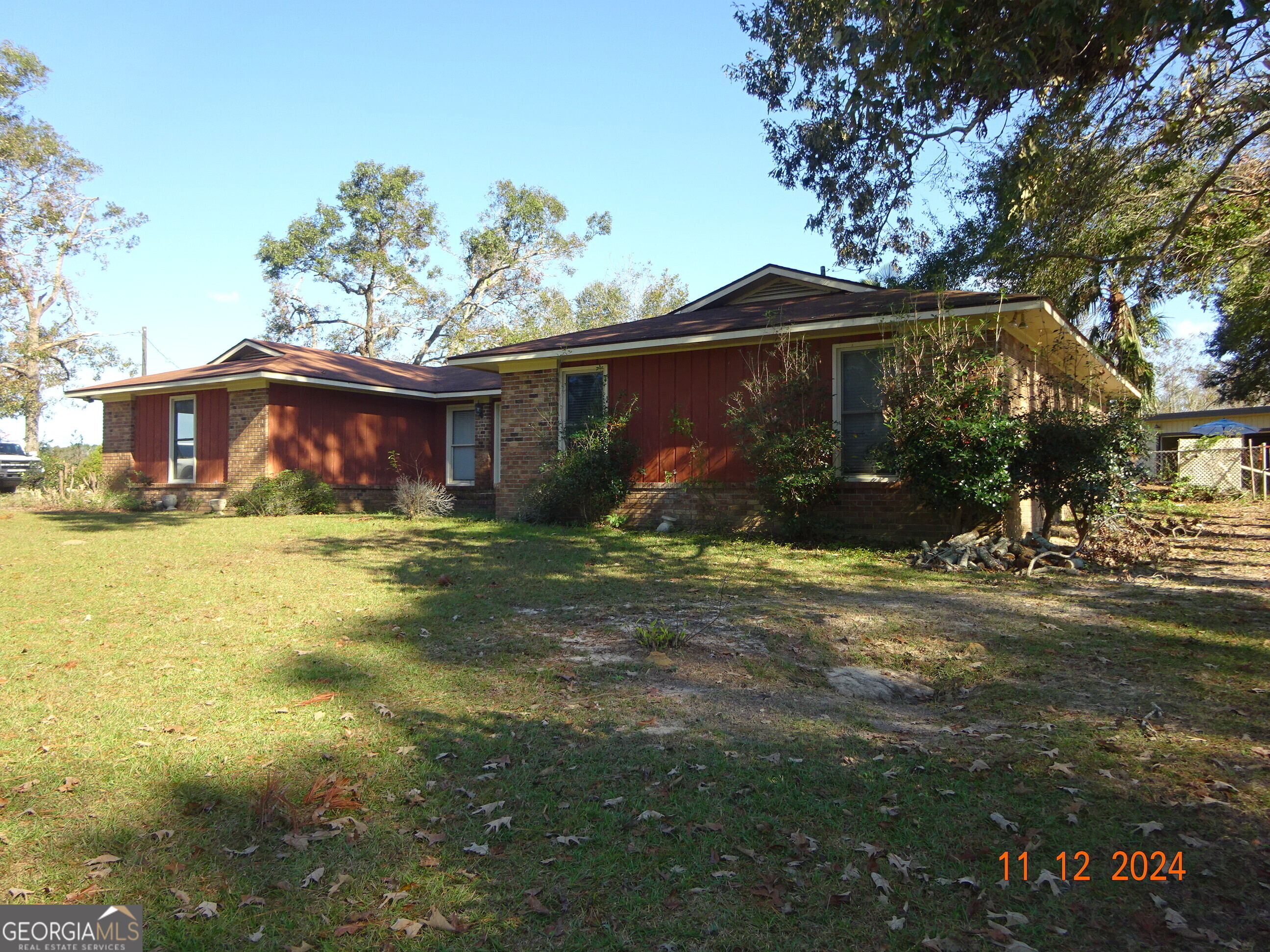 a front view of house with garden