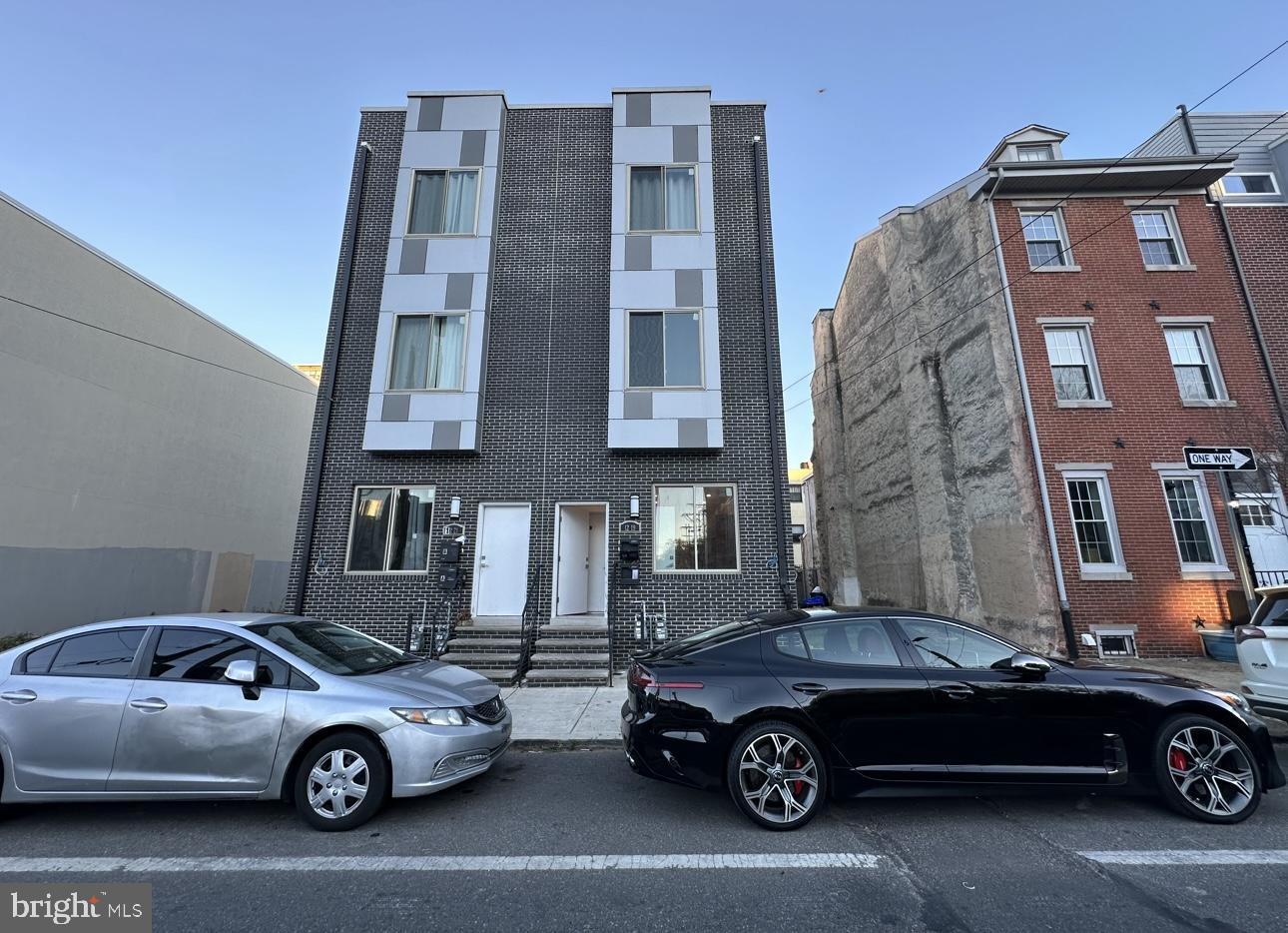 a car parked in front of a building