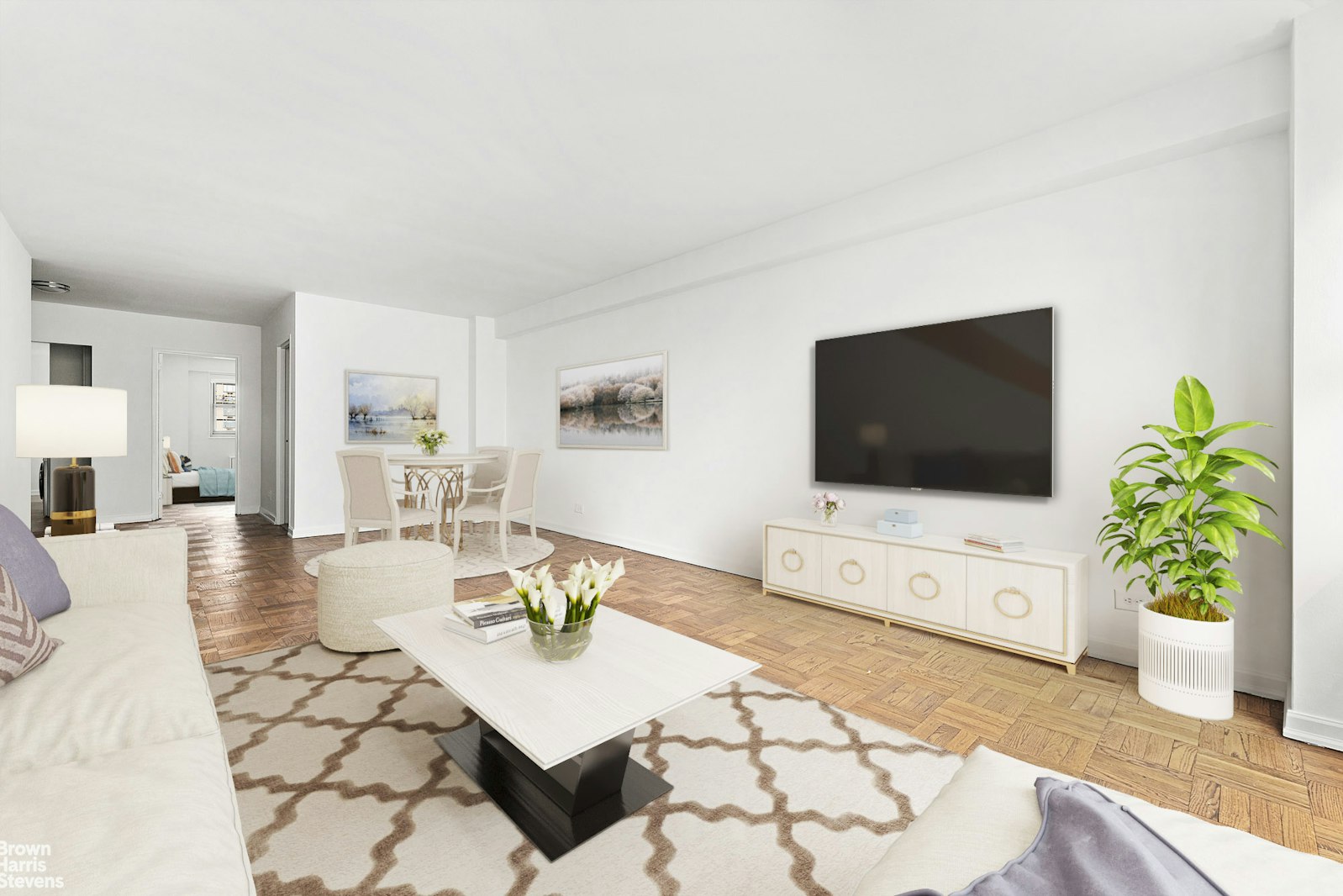 a living room with furniture and a flat screen tv