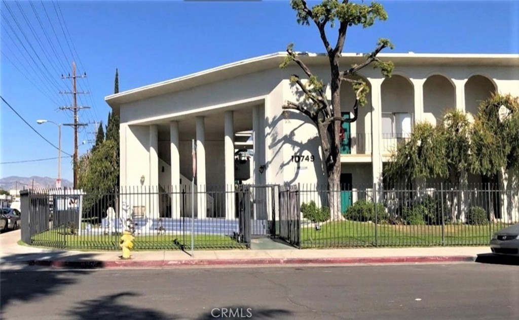 a view of a building with a street