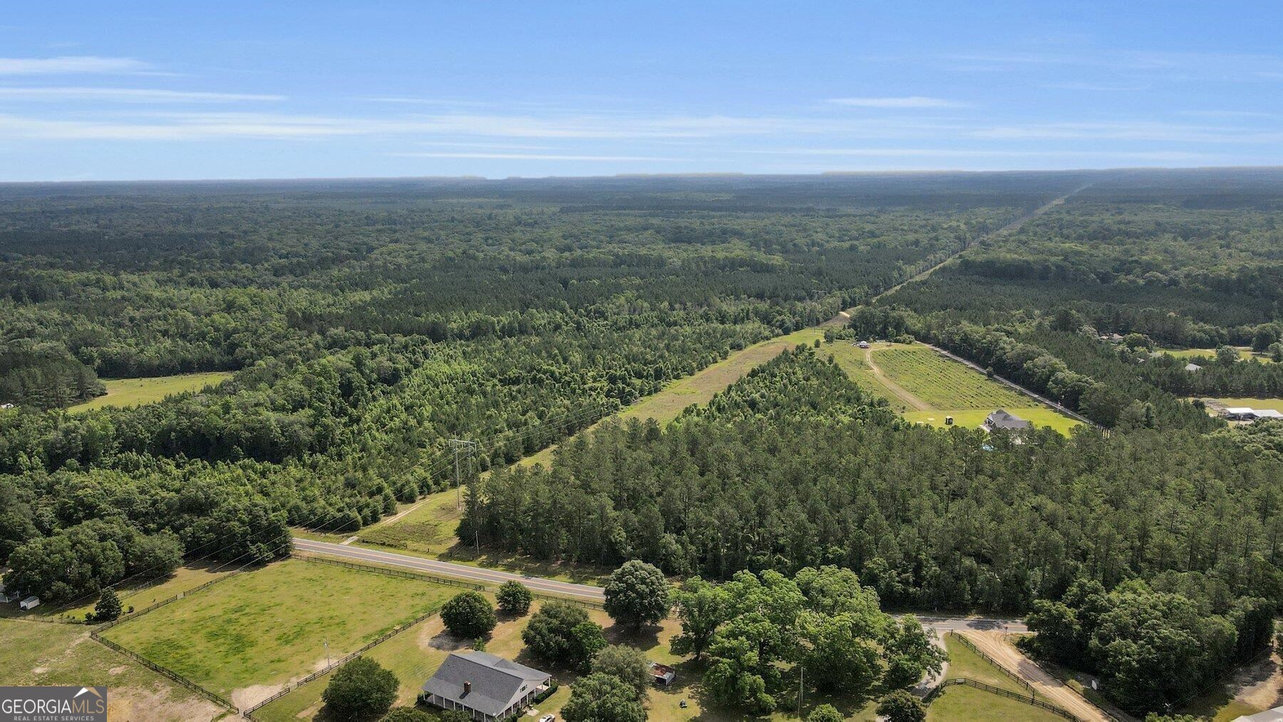 an aerial view of residential house with outdoor space