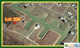 an aerial view of a highlighted house