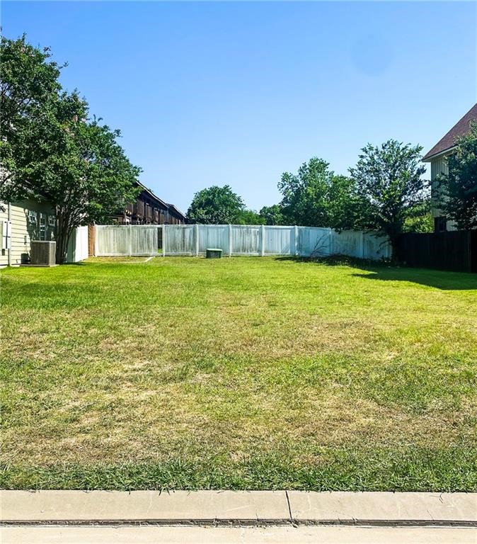 a view of a yard with an outdoor space