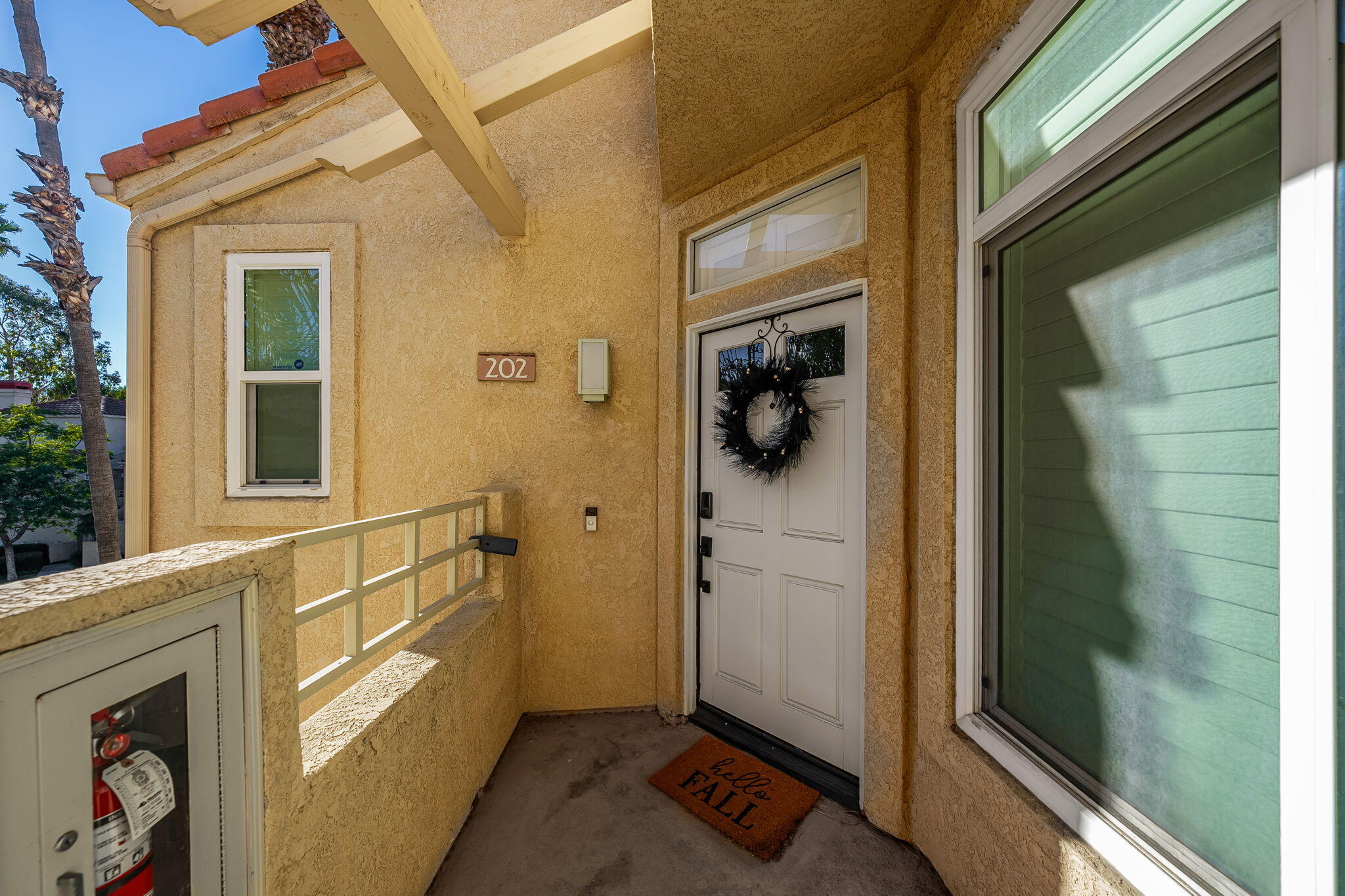 a view of a door and a car parked front door