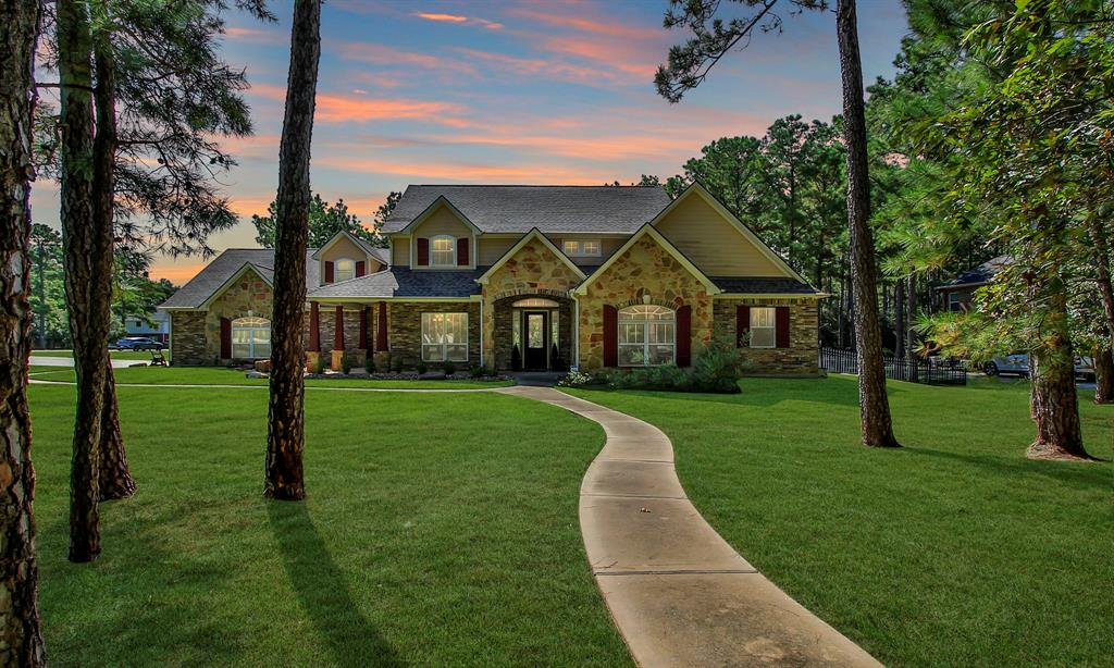 front view of a house with a yard