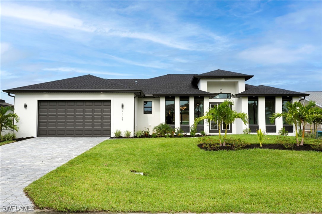 front view of a house with a yard