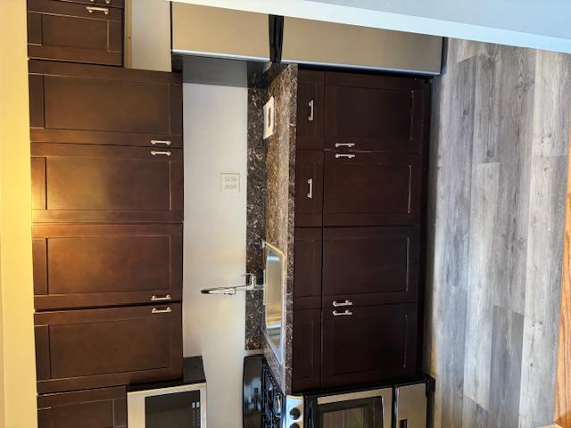 a kitchen with a cabinets and a stove