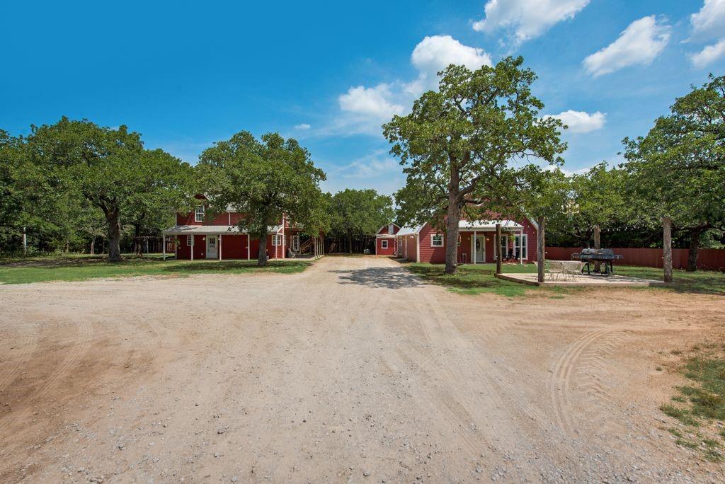 a house with trees in the background