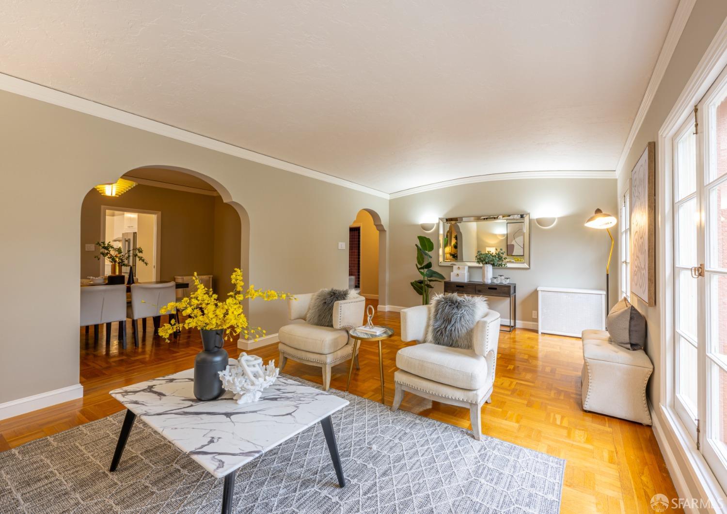 a living room with furniture and a table