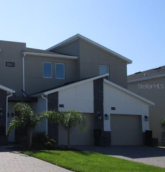 a front view of house with yard