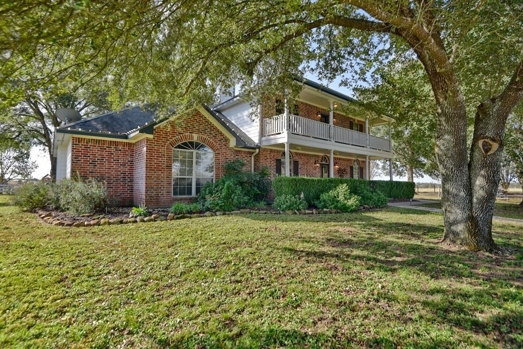 a house with a tree in front of it