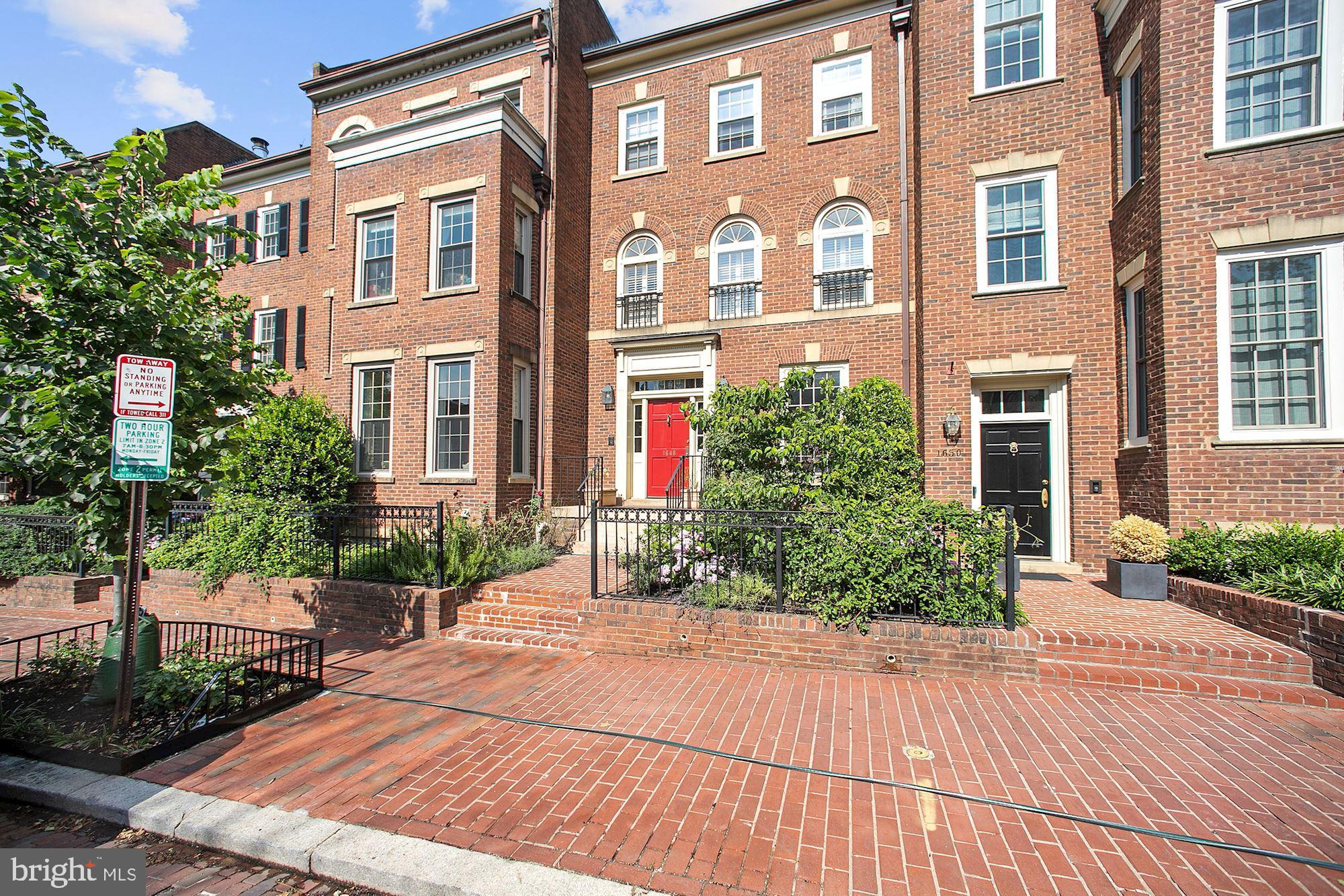 a front view of a multi story residential apartment building