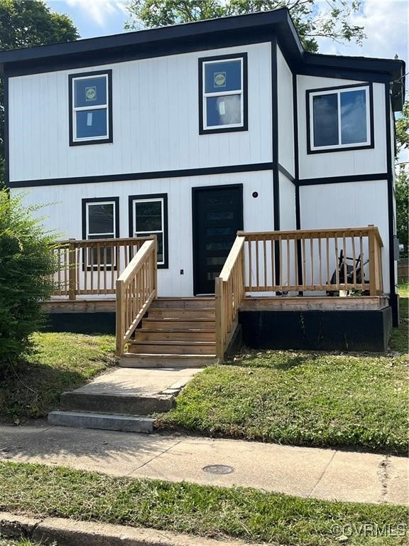 View of front of house featuring covered porch