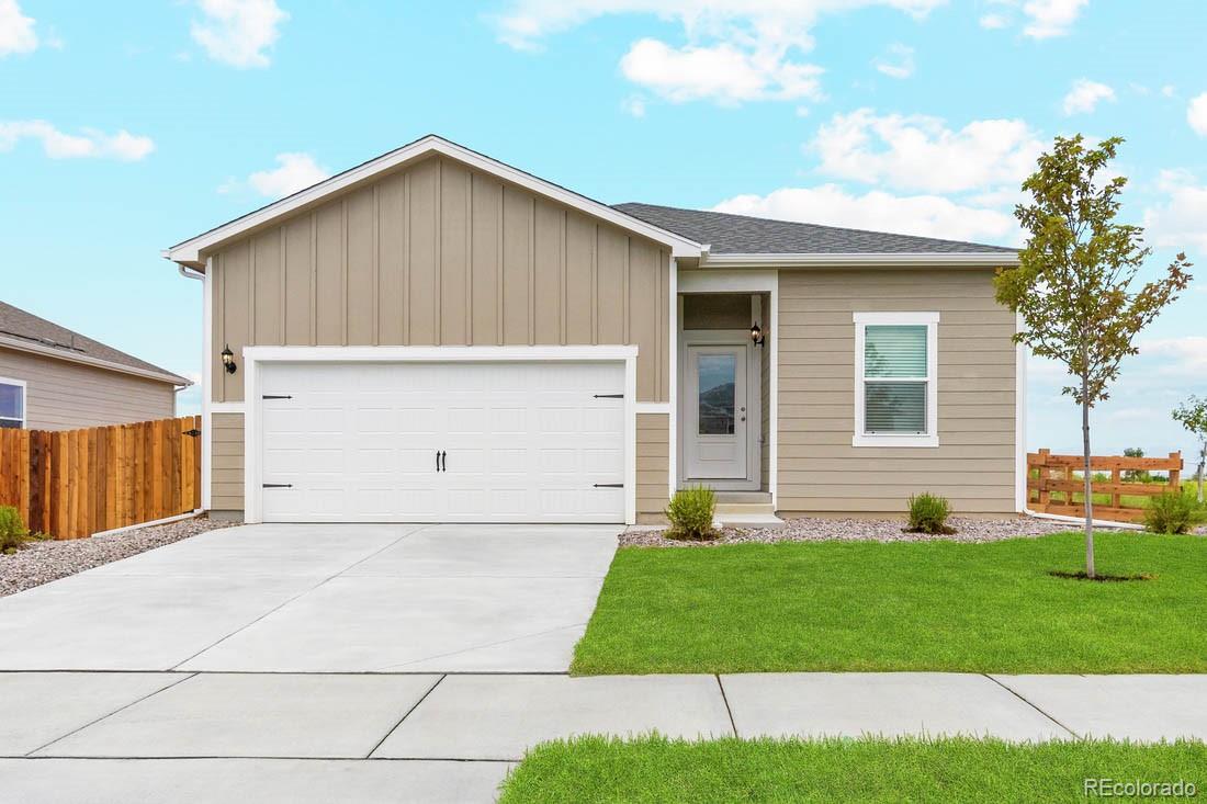 a front view of house with yard