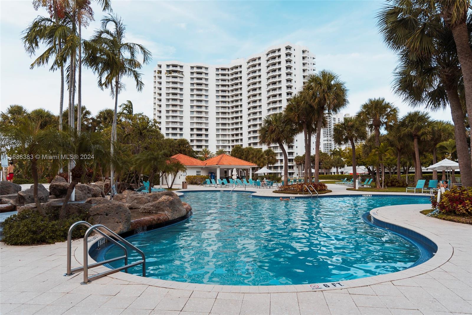 a view of swimming pool with outdoor seating