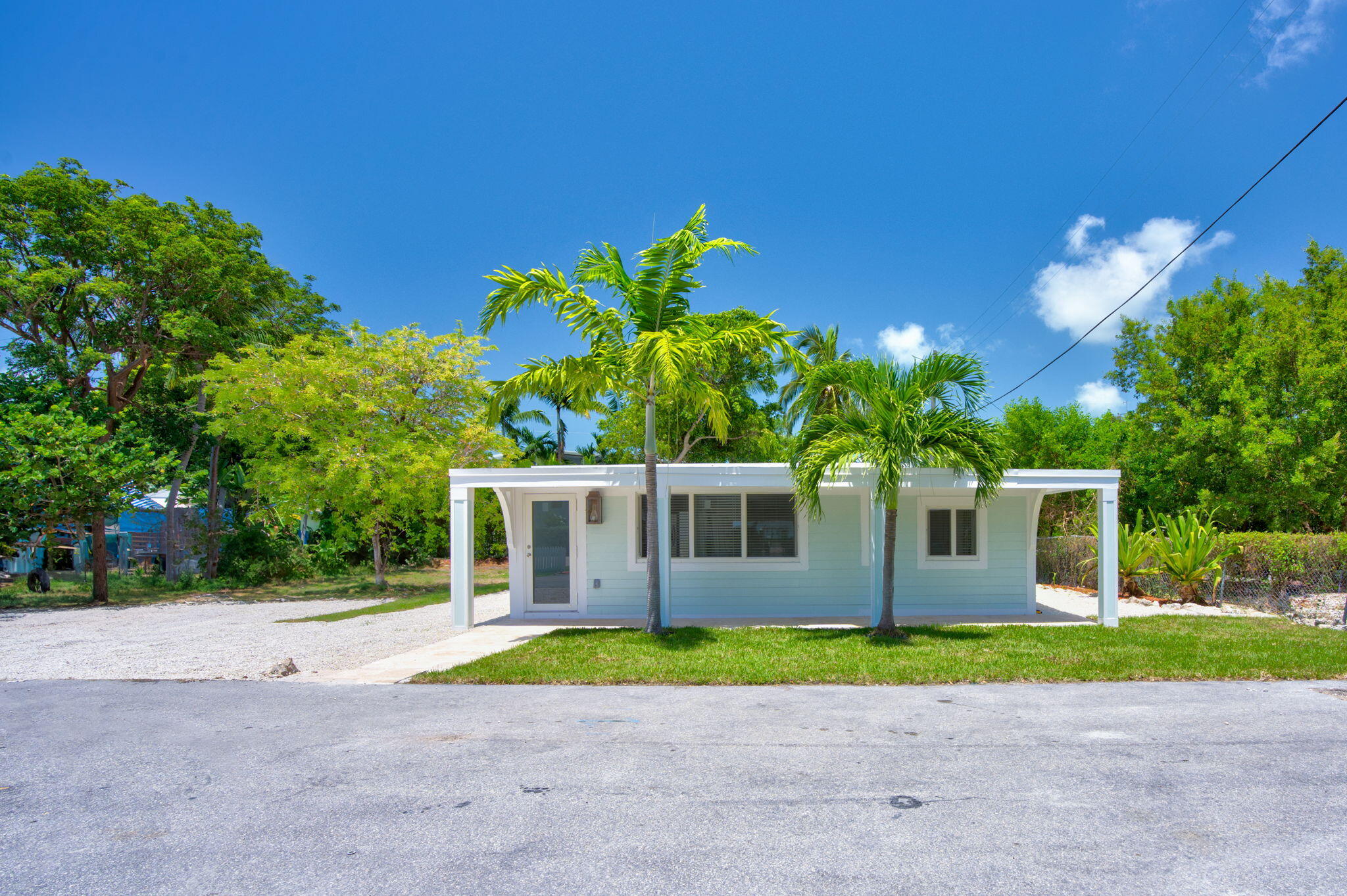 a view of front a house with a yard