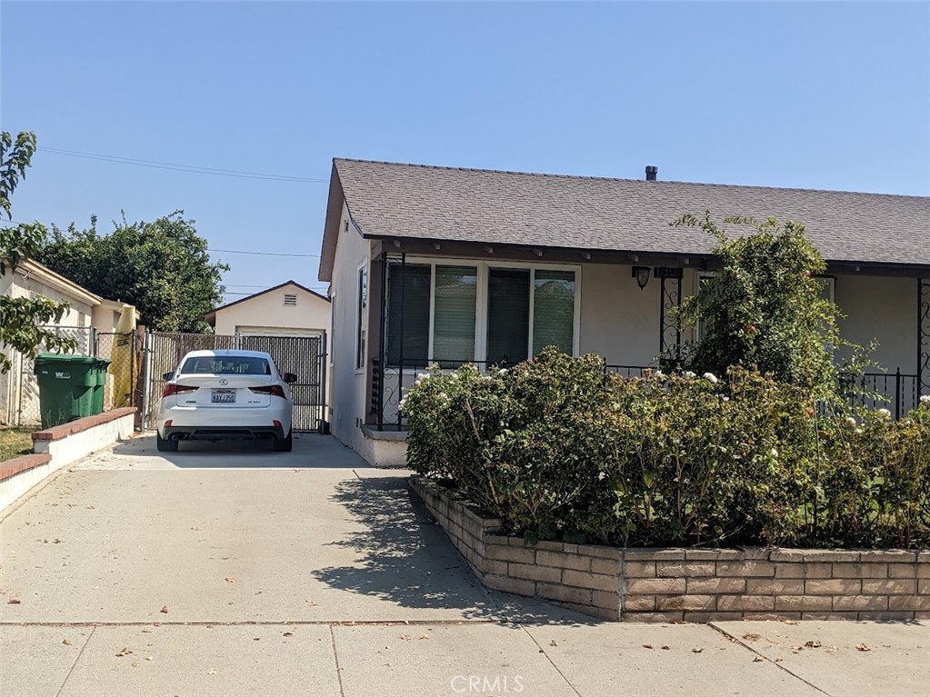 a car parked in front of a house