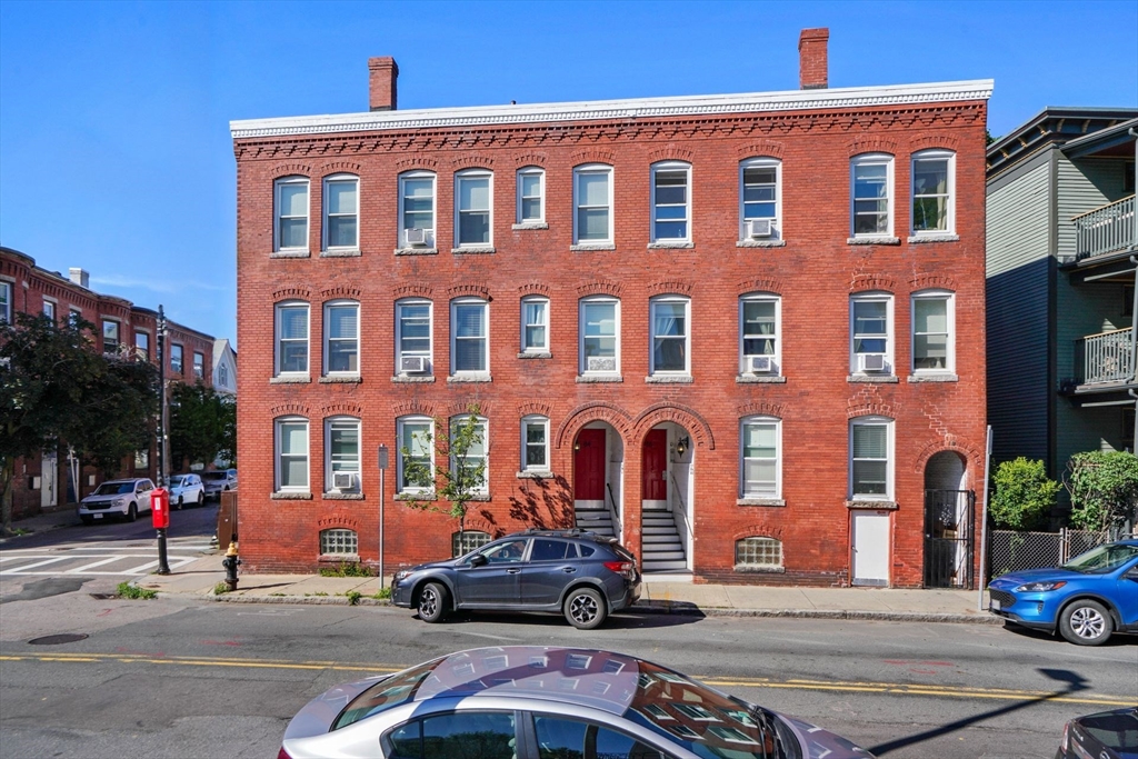 a car parked in front of a building