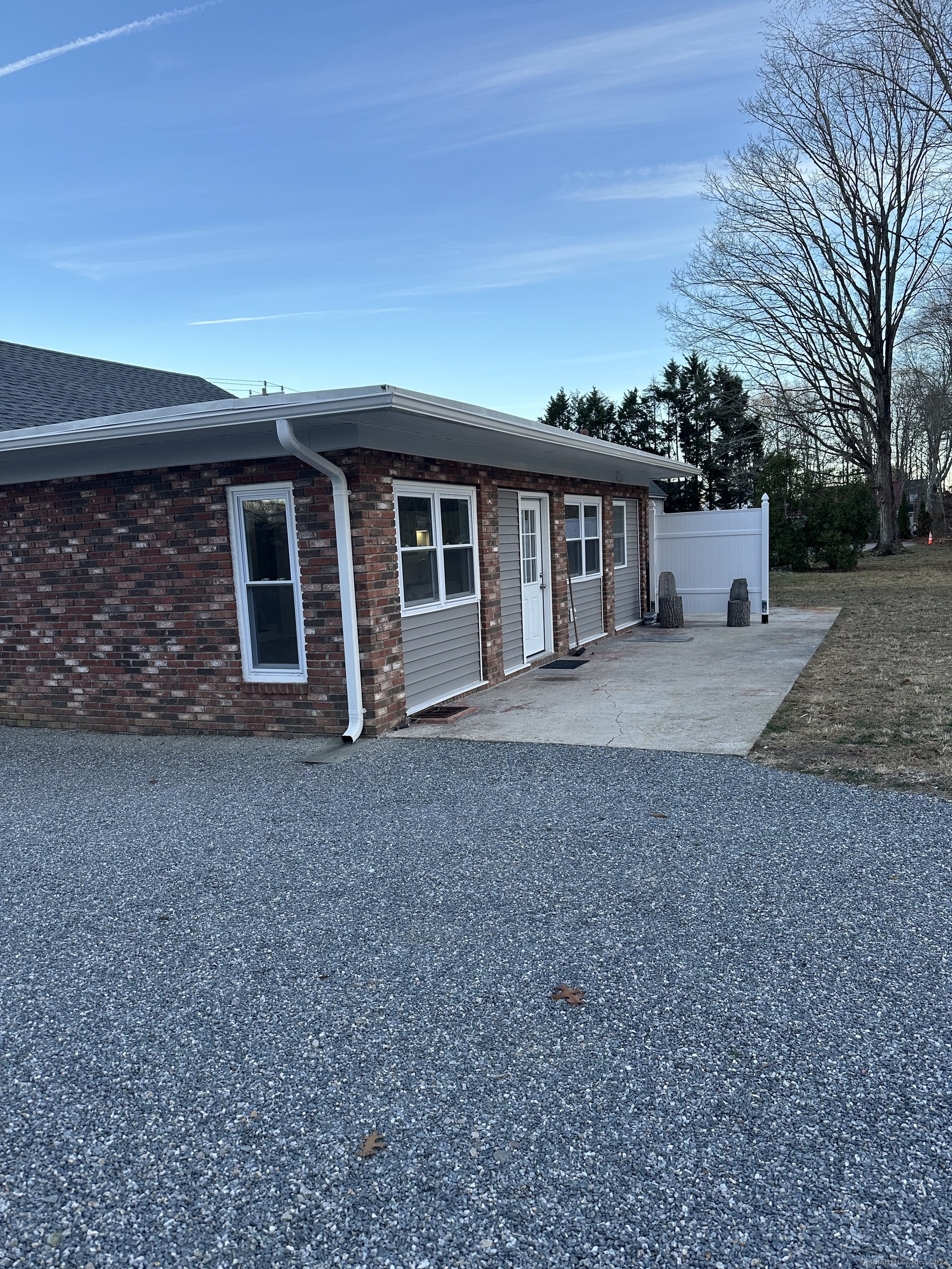 front view of a house with a dry yard