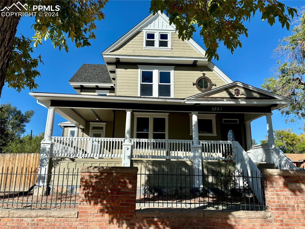 View of front of property featuring a porch