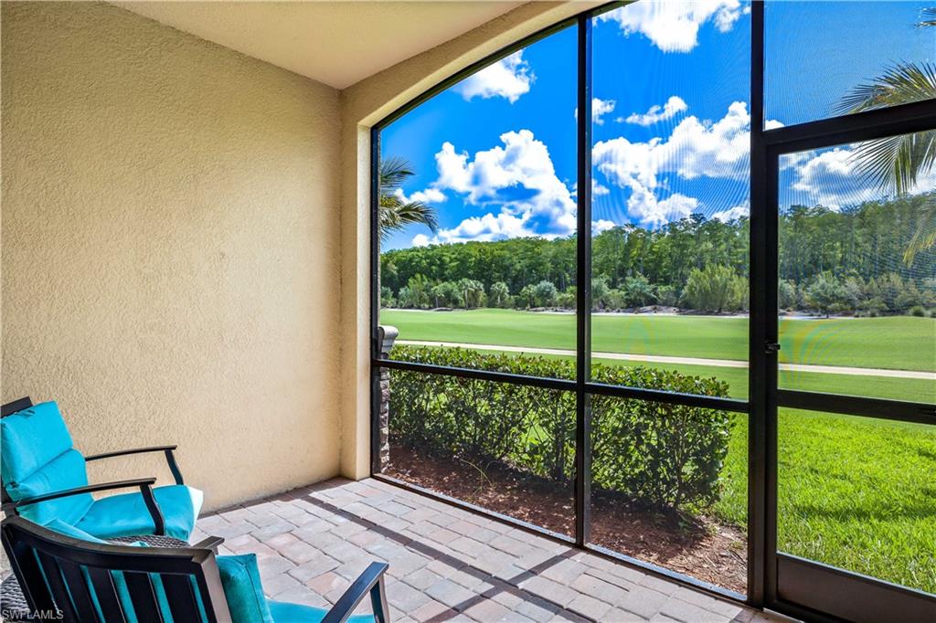 a view of a porch with a furniture