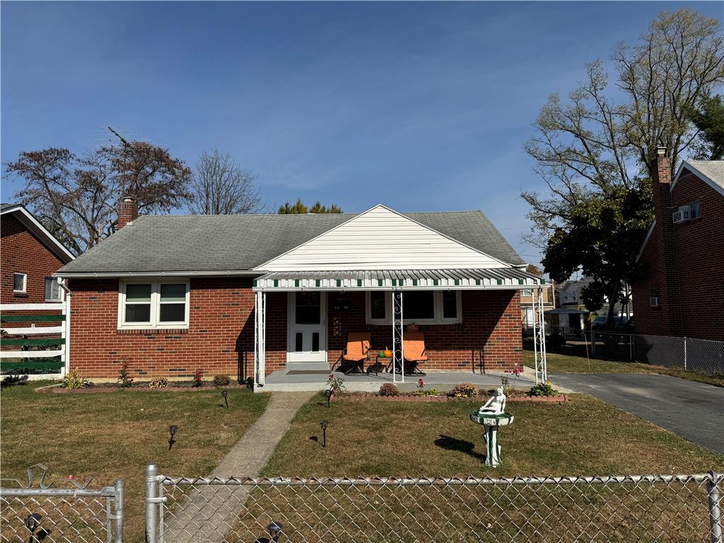 front view of a house with a patio