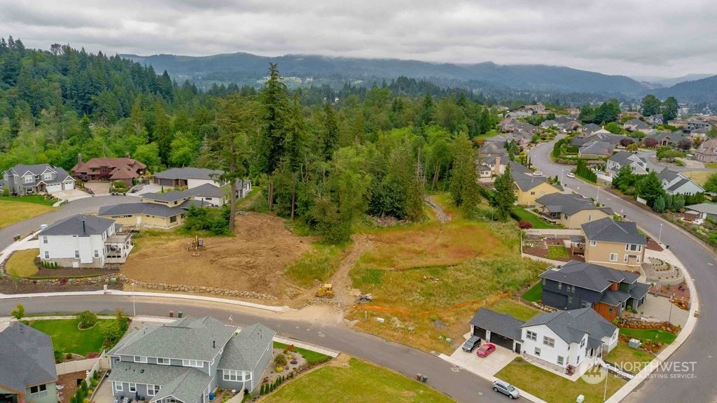 an aerial view of a house with a garden