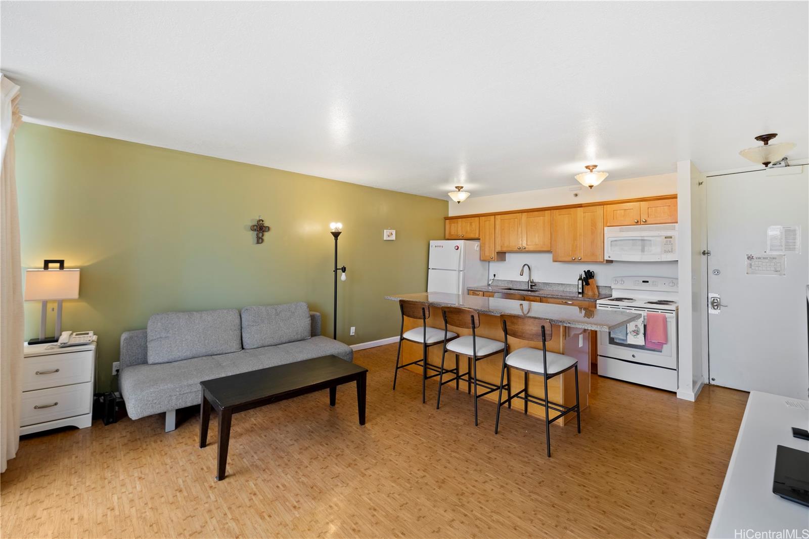 a living room with furniture and a table