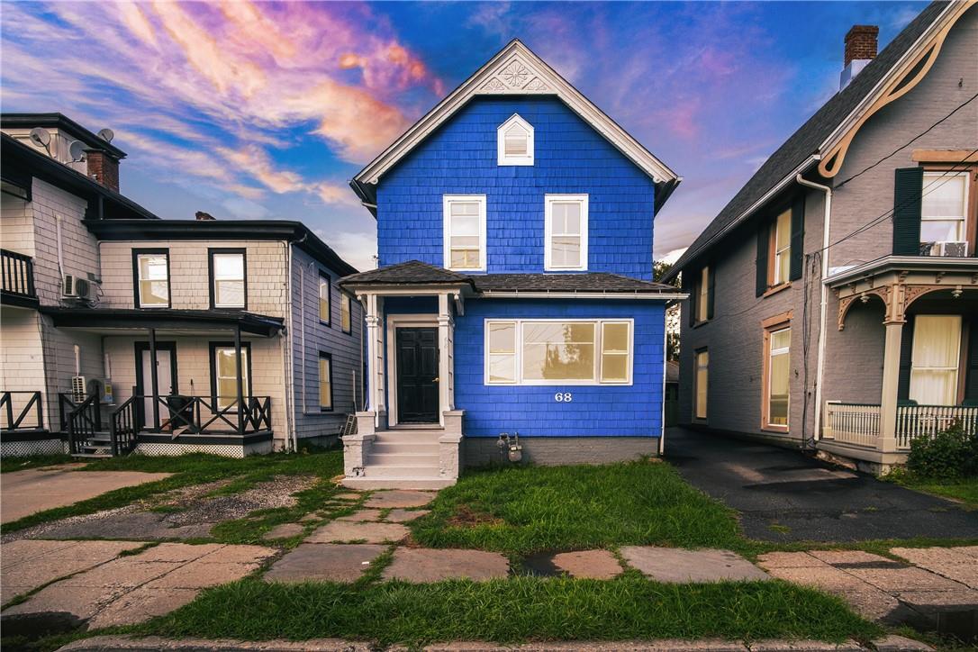 View of front of property with a porch