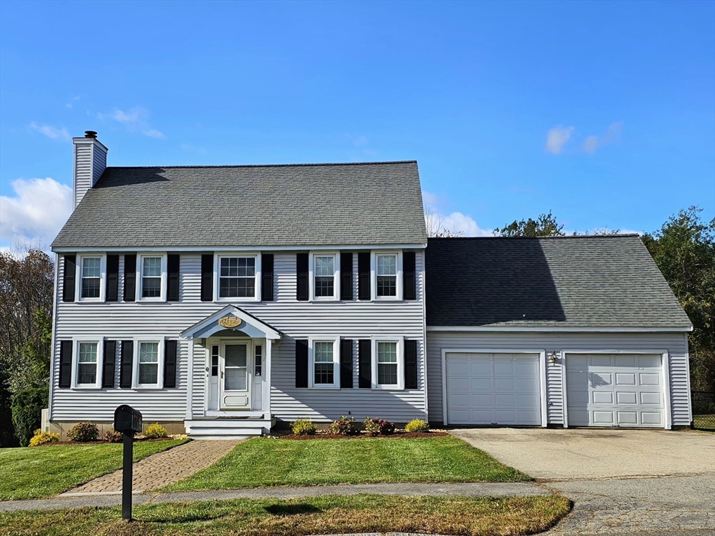 front view of house with a yard