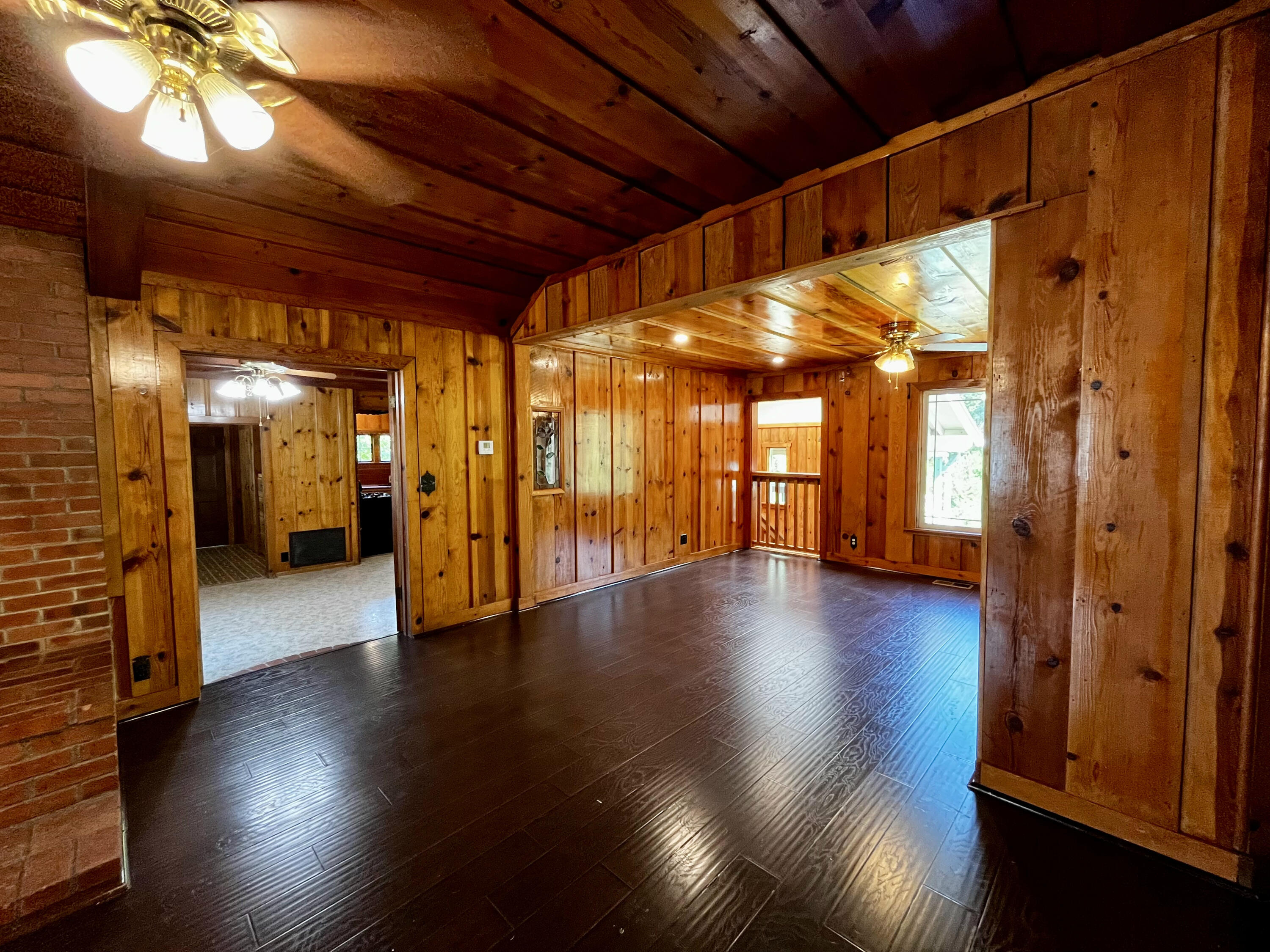 a view of gallery with wooden floor