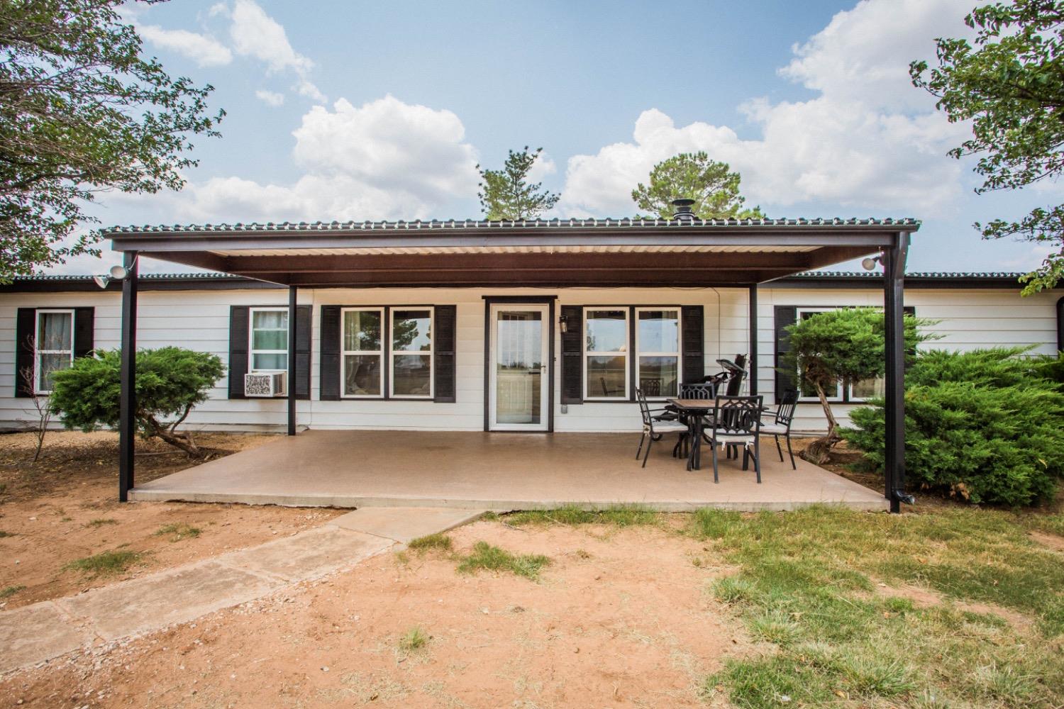 a view of a house with patio