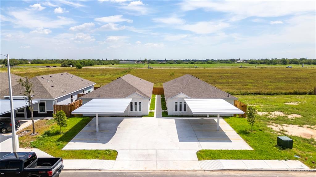 Birds eye view of property featuring a rural view