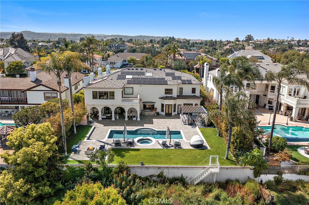 an aerial view of a house with a garden