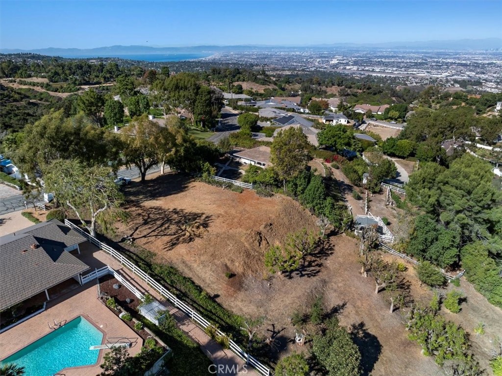 an aerial view of a residential houses with outdoor space