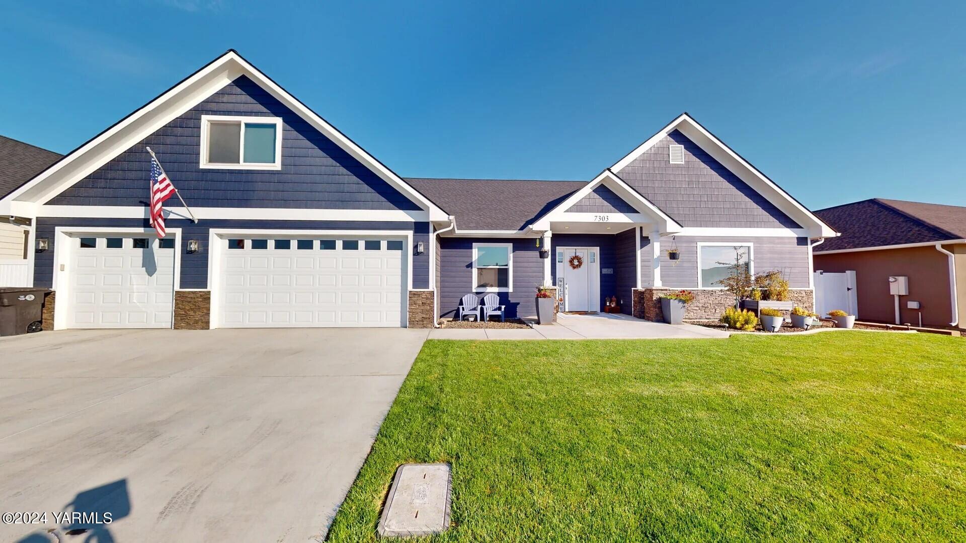 a front view of a house with swimming pool and porch