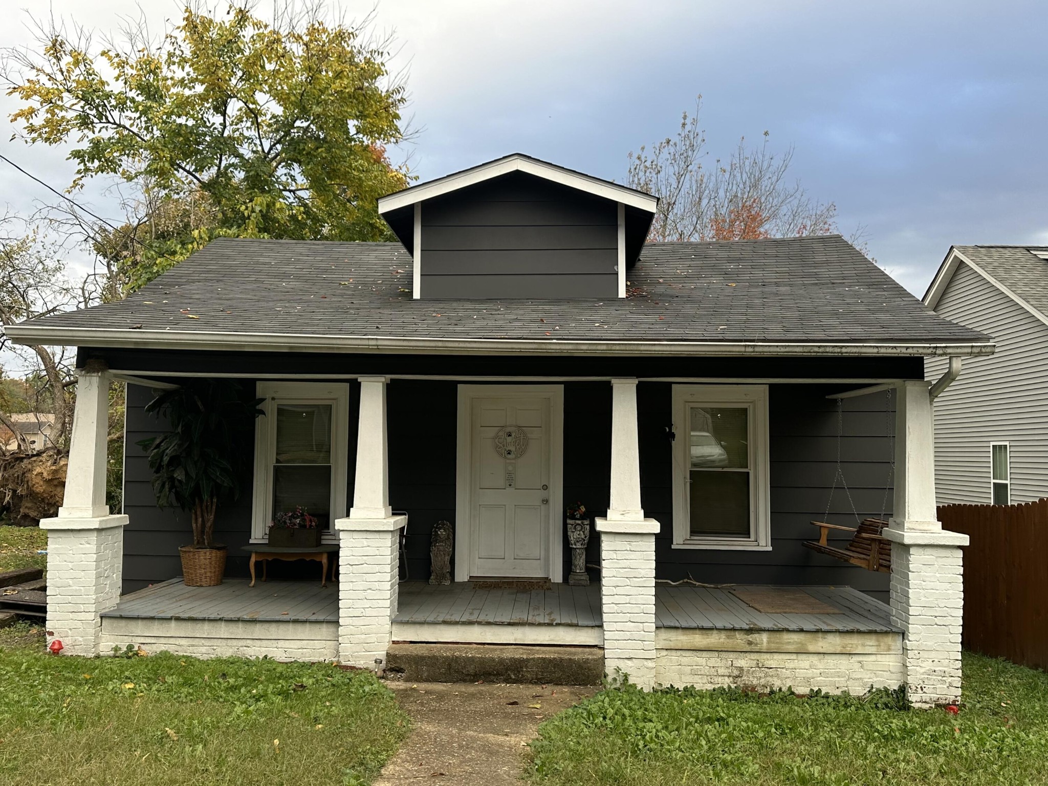 a front view of a house with yard