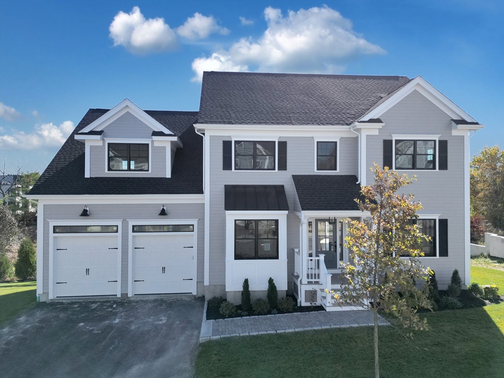 a view of house with yard