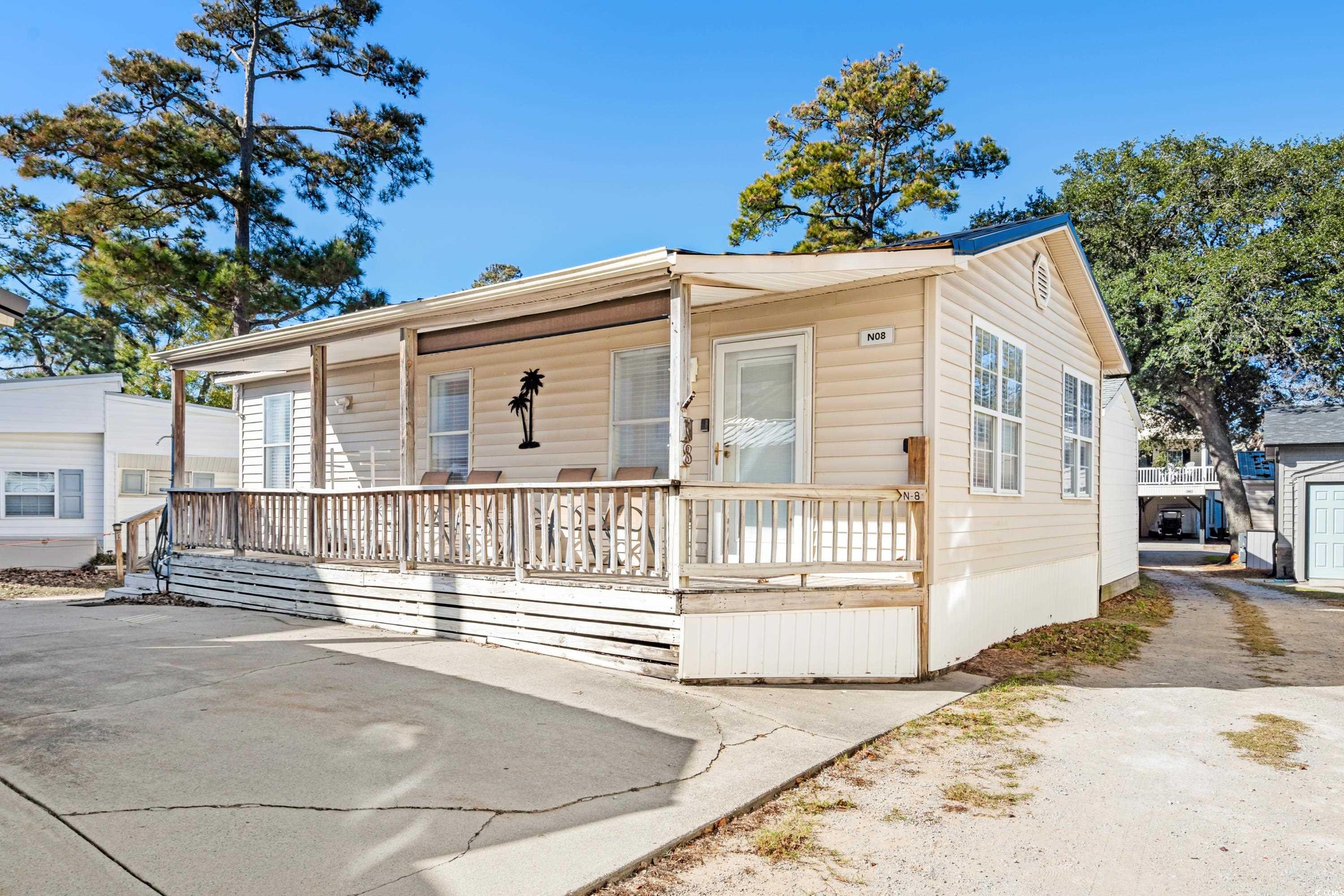 View of front of property with covered porch