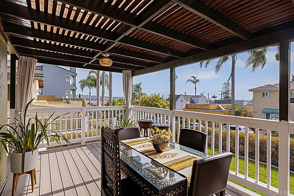 Unwind on the front deck and take in the ocean, lagoon, and sunset views