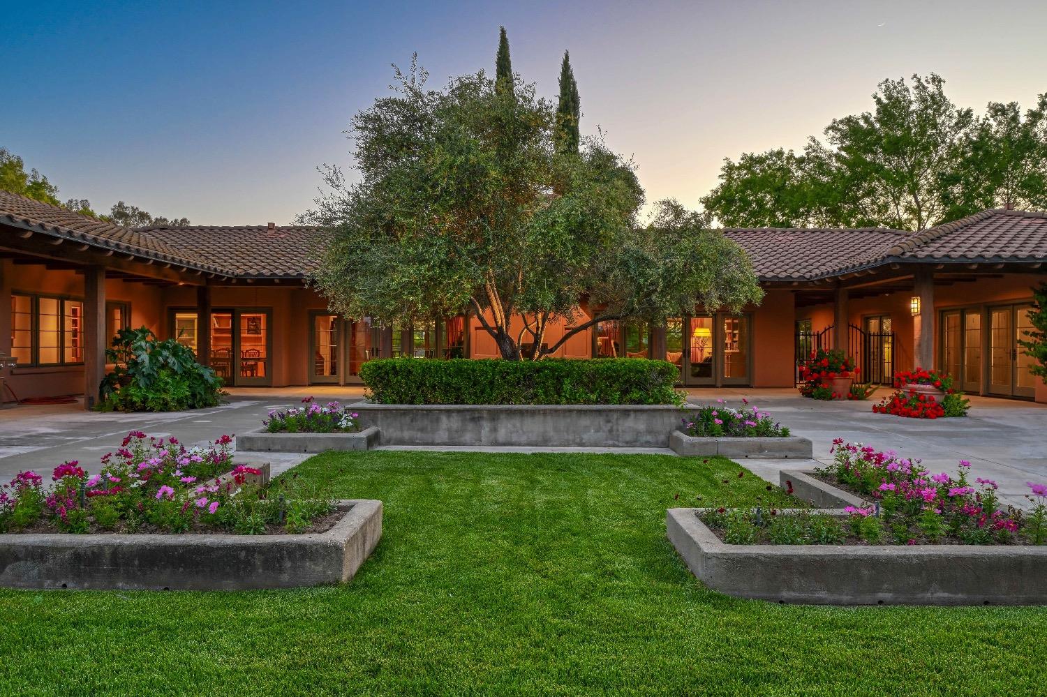 a view of a house with a garden