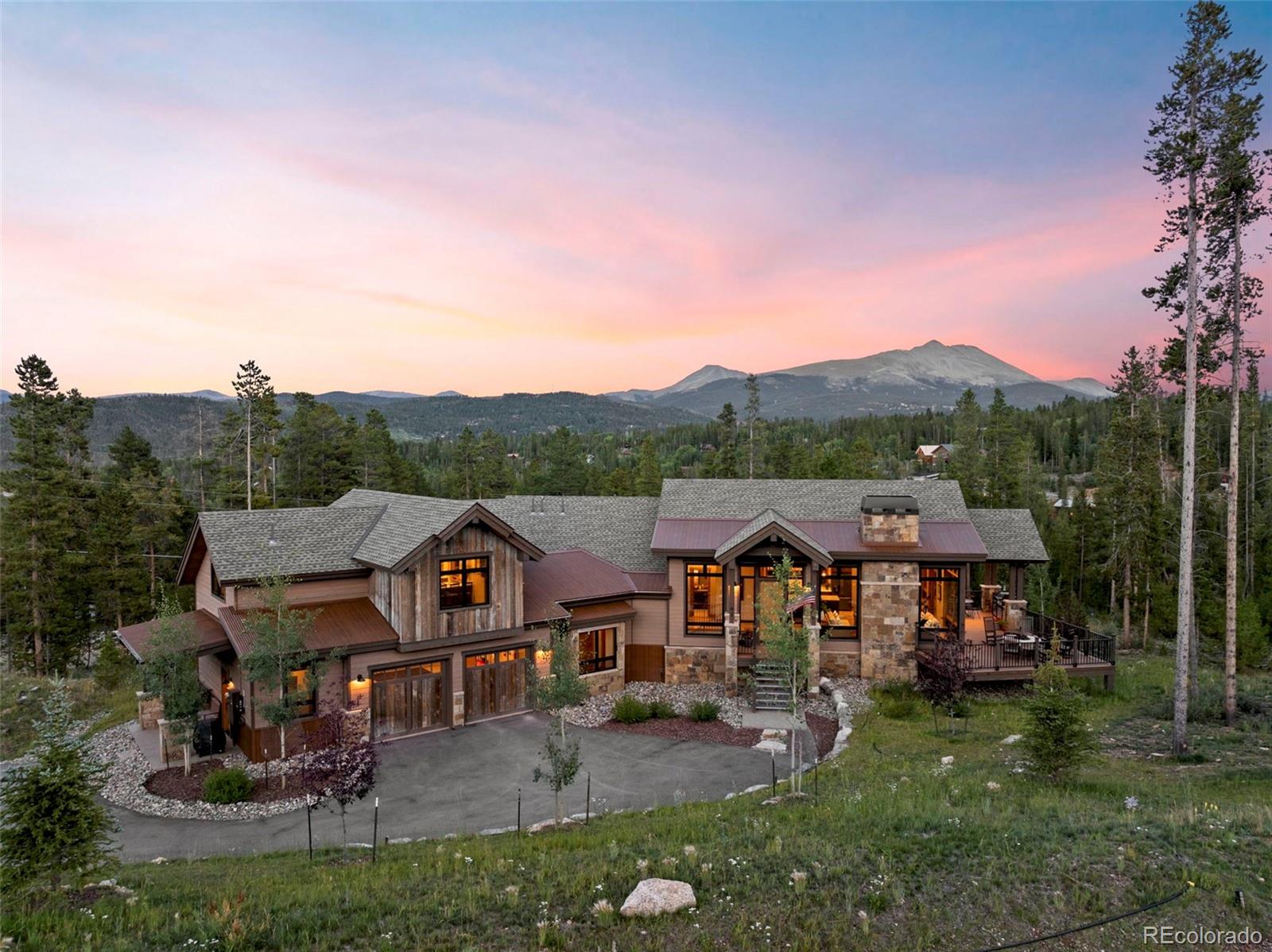 an aerial view of a house with a big yard