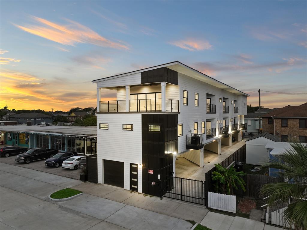 a front view of a house with parking space